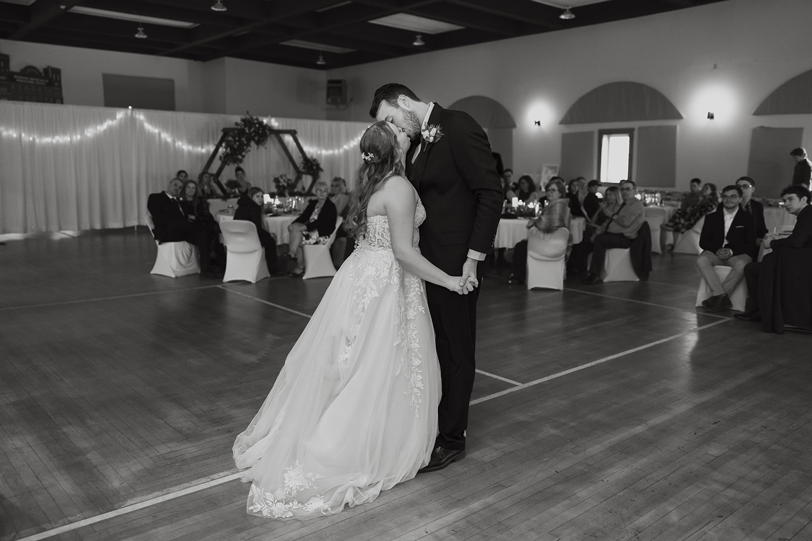 Bride and groom during their first dance at Dee Stadium wedding reception in Houghton