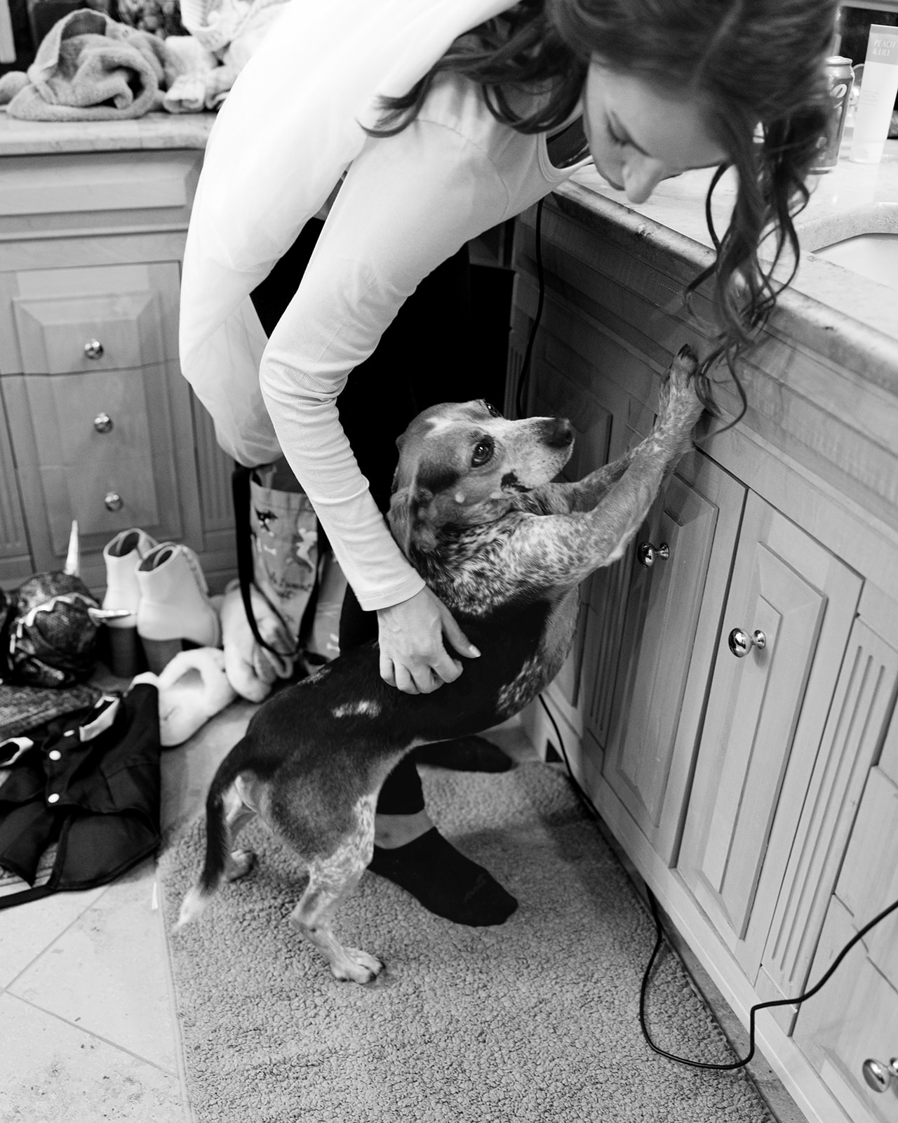 Bride gets ready with her dog at the Keweenaw Castle during her Keweenaw Peninsula Elopement