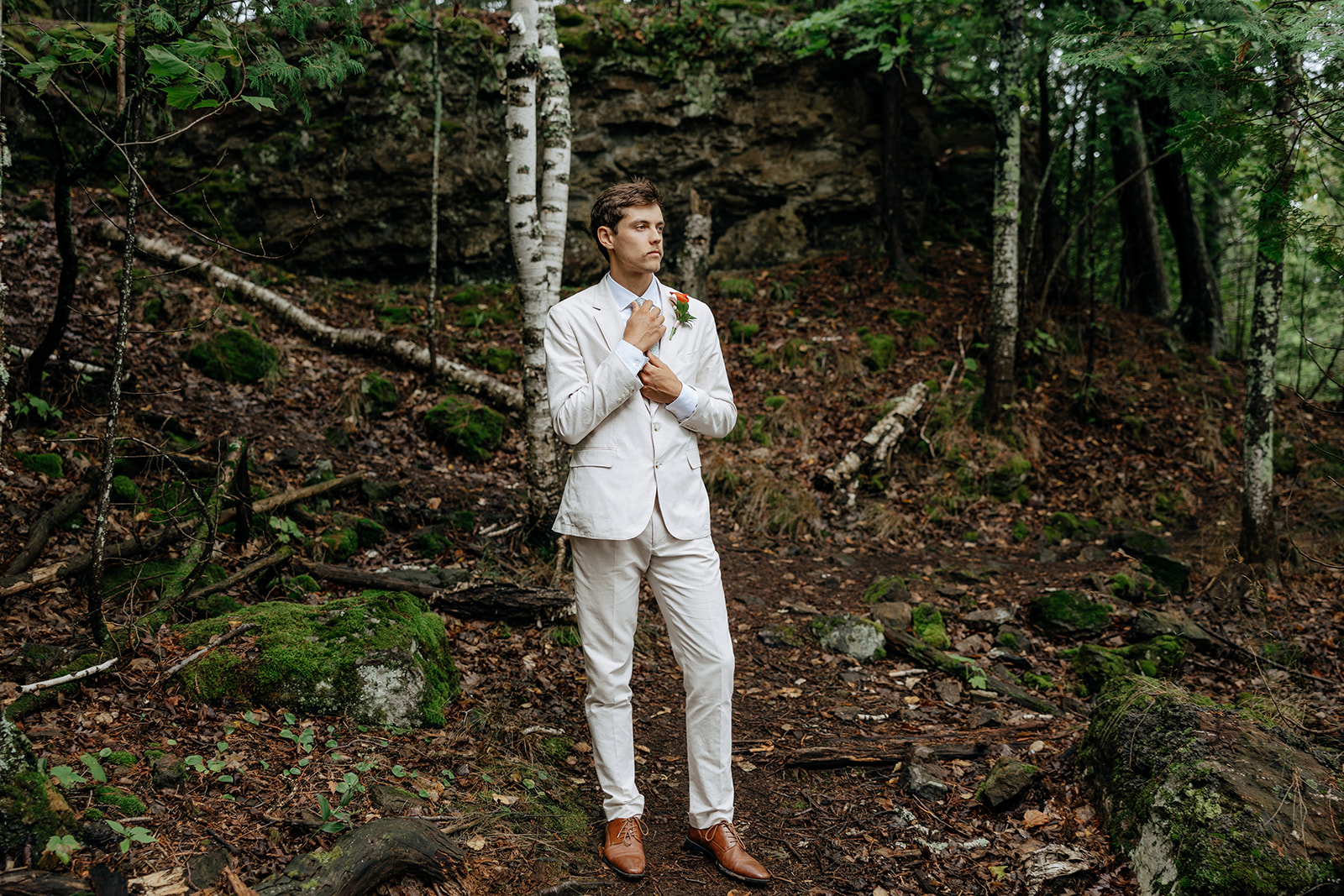 Bride and groom portraits on Lake Superior in Marquette Michigan at Presque Isle
