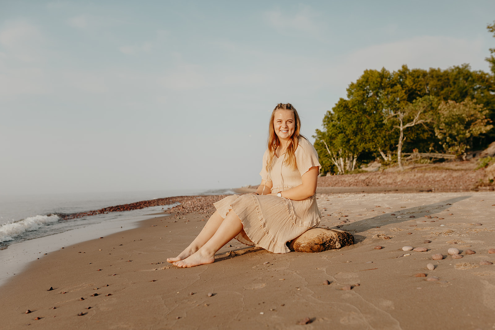 Abi's senior photos in Eagle River Michigan on the sandy beach in late evening
